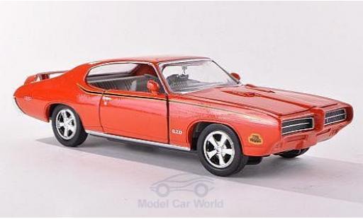 Miniature Pontiac GTO 1/24 Motormax Judge orange 1969 Pontiac GTO 1/24 Motormax Judge orange 1969 miniature