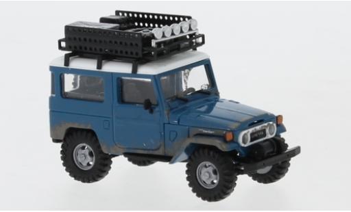 Miniature Toyota Land Cruiser 1/87 Busch J4 bleue/blanche 1960 avec Rack de toit et traces d Offroad Toyota Land Cruiser 1/87 Busch J4 bleue/blanche 1960 avec Rack de toit et traces d Offroad miniature