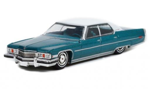 Miniature Cadillac Sedan 1/64 Greenlight DeVille Lowrider metallise turquoise/blanche 1973 Cadillac Sedan 1/64 Greenlight DeVille Lowrider metallise turquoise/blanche 1973 miniature