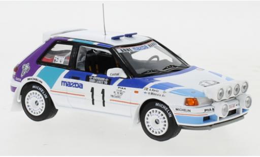 Miniature Mazda 323 1/43 IXO GTX No.11 Rally Team Europe 1000 Lakes Rallye 1990 with night lights H.Mikkola/A.Hertz Mazda 323 1/43 IXO GTX No.11 Rally Team Europe 1000 Lakes Rallye 1990 with night lights H.Mikkola/A.Hertz miniature