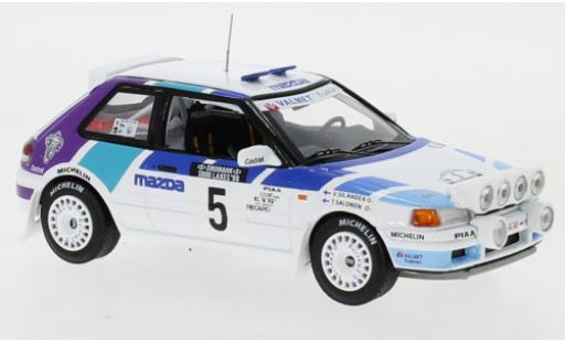 Miniature Mazda 323 1/43 IXO GTX No.5 Rally Team Europe 1000 Lakes Rallye 1990 with night lights T.Salonen/V.Silander Mazda 323 1/43 IXO GTX No.5 Rally Team Europe 1000 Lakes Rallye 1990 with night lights T.Salonen/V.Silander miniature