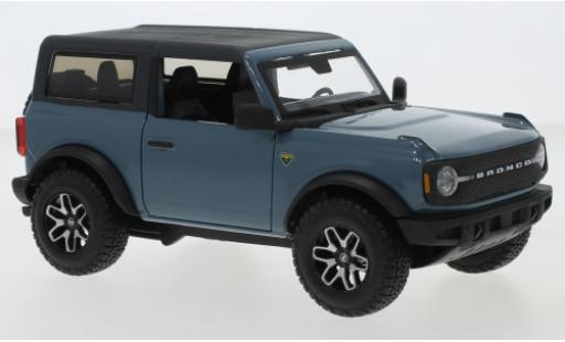 Miniature Ford Bronco 1/24 Maisto Badlands bleue/matt-noire 2021 Ford Bronco 1/24 Maisto Badlands bleue/matt-noire 2021 miniature