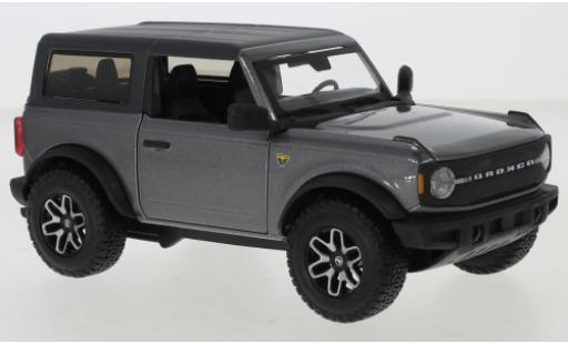 Miniature Ford Bronco 1/24 Maisto Badlands metallise grise/matt-noire 2021 Ford Bronco 1/24 Maisto Badlands metallise grise/matt-noire 2021 miniature