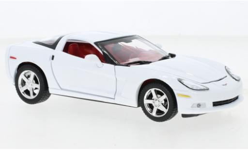 Miniature Chevrolet Corvette 1/24 Motormax (C6) blanche 2005 Chevrolet Corvette 1/24 Motormax (C6) blanche 2005 miniature