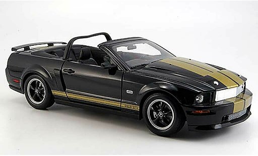 Shelby GT GT-H 1/18 Shelby Collectibles h cabriolet noire avec bandes or 2006 miniature