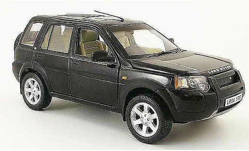 Land Rover Freelander Base 1/18 Ertl noire 4 portes volant a droite miniature