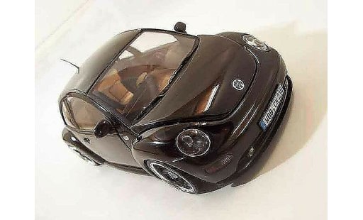 Volkswagen New Beetle Base 1/18 Solido men in black miniature