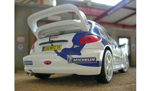 Peugeot 206 WRC 1/18 Solido 1999 # 15 Clarion Panizzi blanche miniature