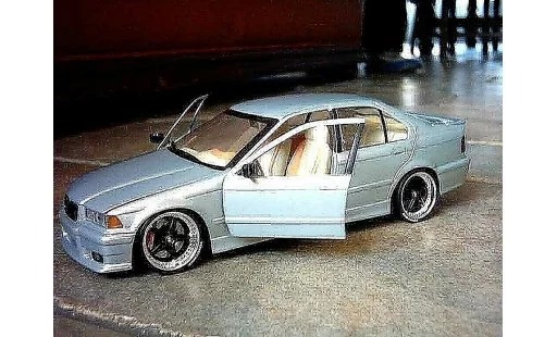Bmw 318 tuning 1/18 Ut Models E36 is berline jantes racing harts 18 pouces miniature