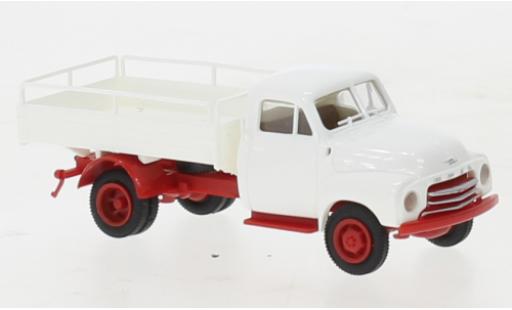 Miniature Opel Blitz 1/87 Brekina Bierpritsche blanche/rouge 1952 Opel Blitz 1/87 Brekina Bierpritsche blanche/rouge 1952 miniature
