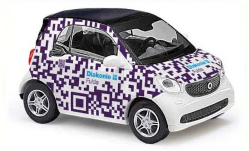 Miniature Smart ForTwo 1/87 Busch Fortwo Diakonie Fulda 2014 Smart ForTwo 1/87 Busch Fortwo Diakonie Fulda 2014 miniature