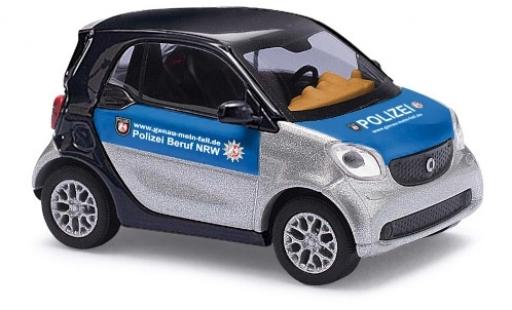 Miniature Smart ForTwo 1/87 Busch Fortwo Polizei 2014 Smart ForTwo 1/87 Busch Fortwo Polizei 2014 miniature