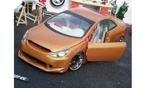 Peugeot 307 CC 1/18 Solido orange miniature
