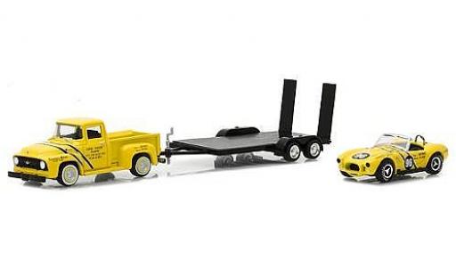 Miniature Ford F-1 1/64 Greenlight 00 jaune 1954 with Coventry Moteurs 289 Cobra and Flatbed Trailer Ford F-1 1/64 Greenlight 00 jaune 1954 with Coventry Moteurs 289 Cobra and Flatbed Trailer miniature