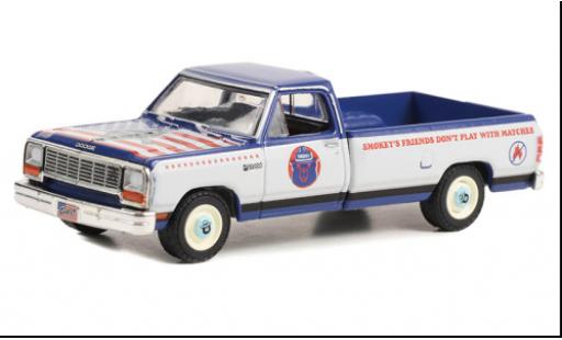 Dodge RAM 1/64 Greenlight D-150 metallise bleue/beige Smokey Bear 1989 miniature