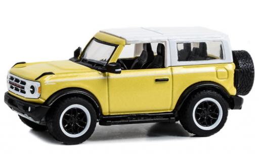 Miniature Ford Bronco 1/64 Greenlight Heritage Edition jaune clair/blanche 2023 Ford Bronco 1/64 Greenlight Heritage Edition jaune clair/blanche 2023 miniature