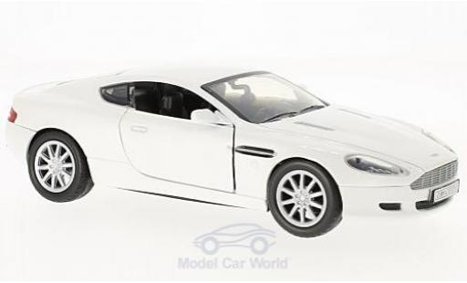 Miniature Aston Martin DB9 1/24 Motormax DB 9 Coupe metallise blanche Aston Martin DB9 1/24 Motormax DB 9 Coupe metallise blanche miniature