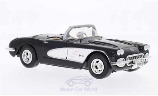 Miniature Chevrolet Corvette 1/24 Motormax (C1) noire/blanche 1959 ohne Vitrine Chevrolet Corvette 1/24 Motormax (C1) noire/blanche 1959 ohne Vitrine miniature