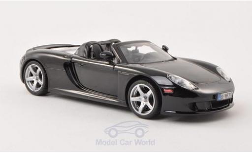 Miniature Porsche Carrera GT 1/24 Motormax noire ohne Vitrine Porsche Carrera GT 1/24 Motormax noire ohne Vitrine miniature