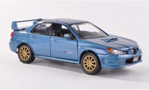 Miniature Subaru Impreza 1/24 Motormax WRX STi metallise bleue Subaru Impreza 1/24 Motormax WRX STi metallise bleue miniature