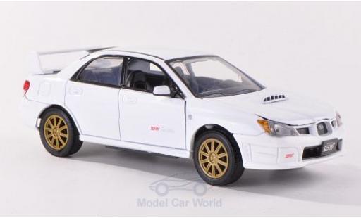 Miniature Subaru Impreza 1/24 Motormax WRX STi blanche Subaru Impreza 1/24 Motormax WRX STi blanche miniature