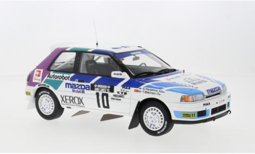 Miniature Mazda 323 1/18 Ottomobile GTX 1000 Lakes Rally 1991 #10 1:18 Mazda 323 1/18 Ottomobile GTX 1000 Lakes Rally 1991 #10 1:18 miniature