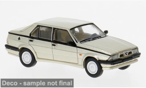 Miniature Alfa Romeo 75 1/87 PCX87 beige 1988 1:87 Alfa Romeo 75 1/87 PCX87 beige 1988 1:87 miniature