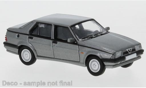 Miniature Alfa Romeo 75 1/87 PCX87 metallise grise 1988 exclusive avec Model Car World Alfa Romeo 75 1/87 PCX87 metallise grise 1988 exclusive avec Model Car World miniature