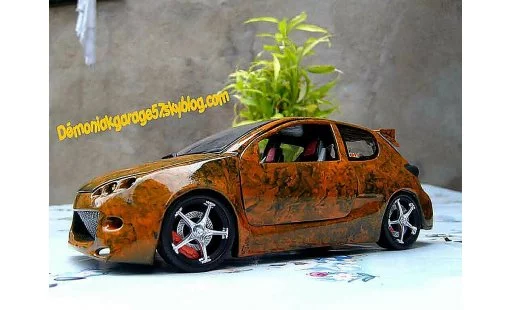 Peugeot 206 WRC 1/18 Norev street racer miniature