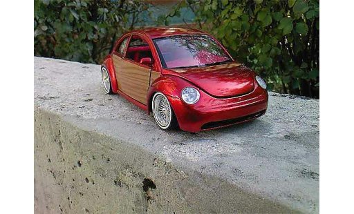 Volkswagen New Beetle Base 1/18 Burago low rider miniature