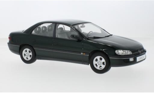 Miniature Opel Omega 1/18 Triple 9 Collection B metallise verte 1996 1:18 Opel Omega 1/18 Triple 9 Collection B metallise verte 1996 1:18 miniature