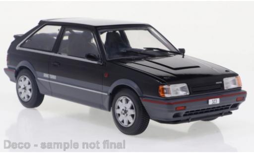 Miniature Mazda 323 1/24 WhiteBox 4WD Turbo noire/metallise grise 1989 Mazda 323 1/24 WhiteBox 4WD Turbo noire/metallise grise 1989 miniature